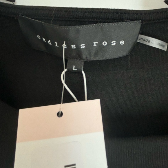 NWT. Organza Ruffle Sleeve Knit Top. Women’s size Large. - Picture 4 of 8